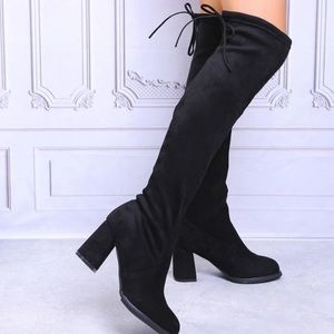 Knee high black boots